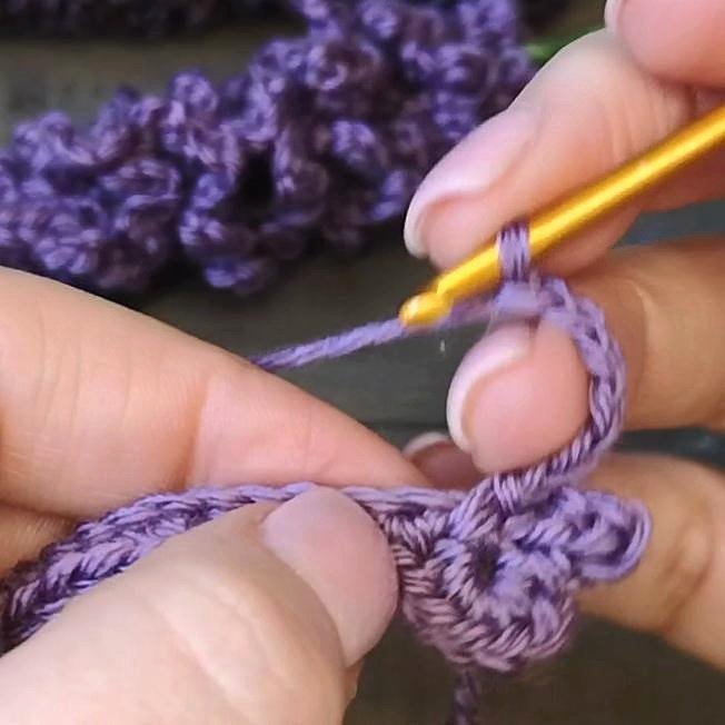 Original photo showing the completed lavender crochet strip