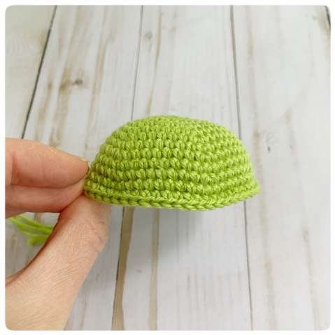 Original crochet frog tutorial photo 2, showing the belly and body being joined and stuffed.