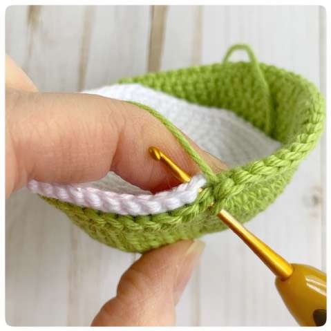 Original crochet frog tutorial photo 3, showing the belly and body being joined and stuffed.