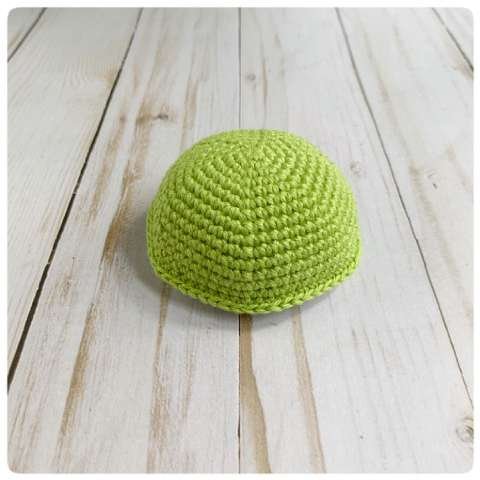 Original crochet frog tutorial photo 6, showing the belly and body being joined and stuffed.