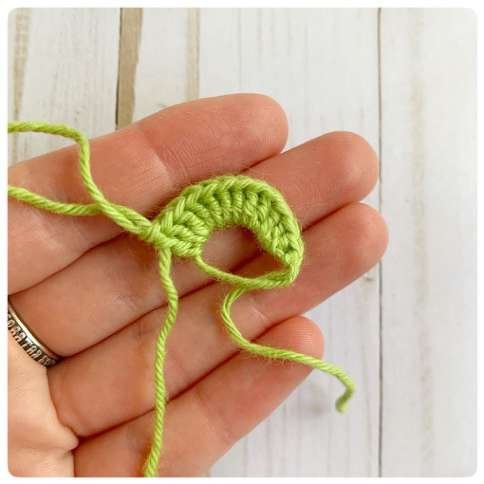 Original crochet frog tutorial photo 15, showing the little crochet paws and toes.