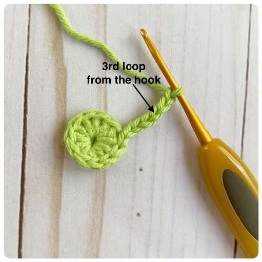 Original crochet frog tutorial photo 18, showing the little crochet paws and toes.