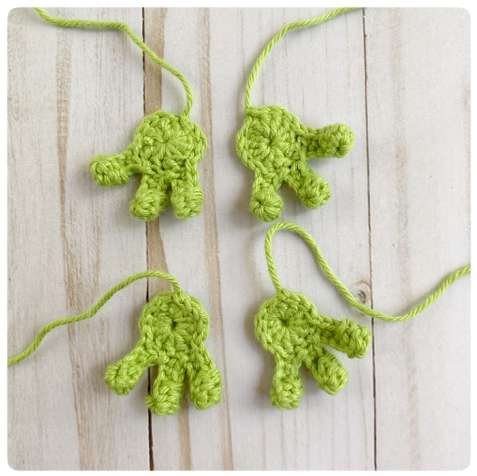 Original crochet frog tutorial photo 22, showing the little crochet paws and toes.
